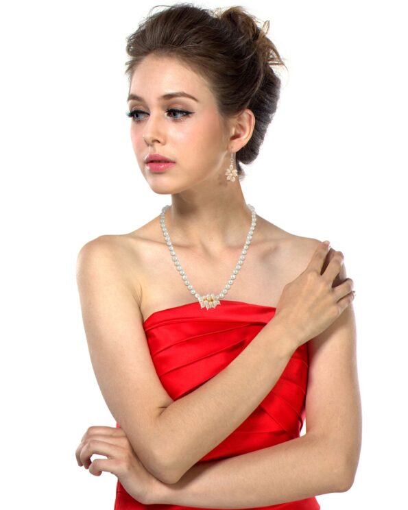 Pearlz Ocean Cool and Crazy Necklace Set made in a Orange Freshwater Pearl which is in Oval Shape Suits on you in any Occasion.