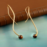 Brass gold plated earring with tiger eyes